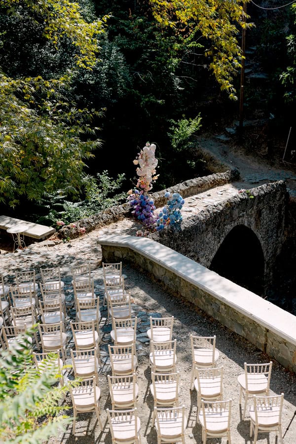 Pastel Colored Wedding Ceremony Stone Bridge Casale Panayiotis